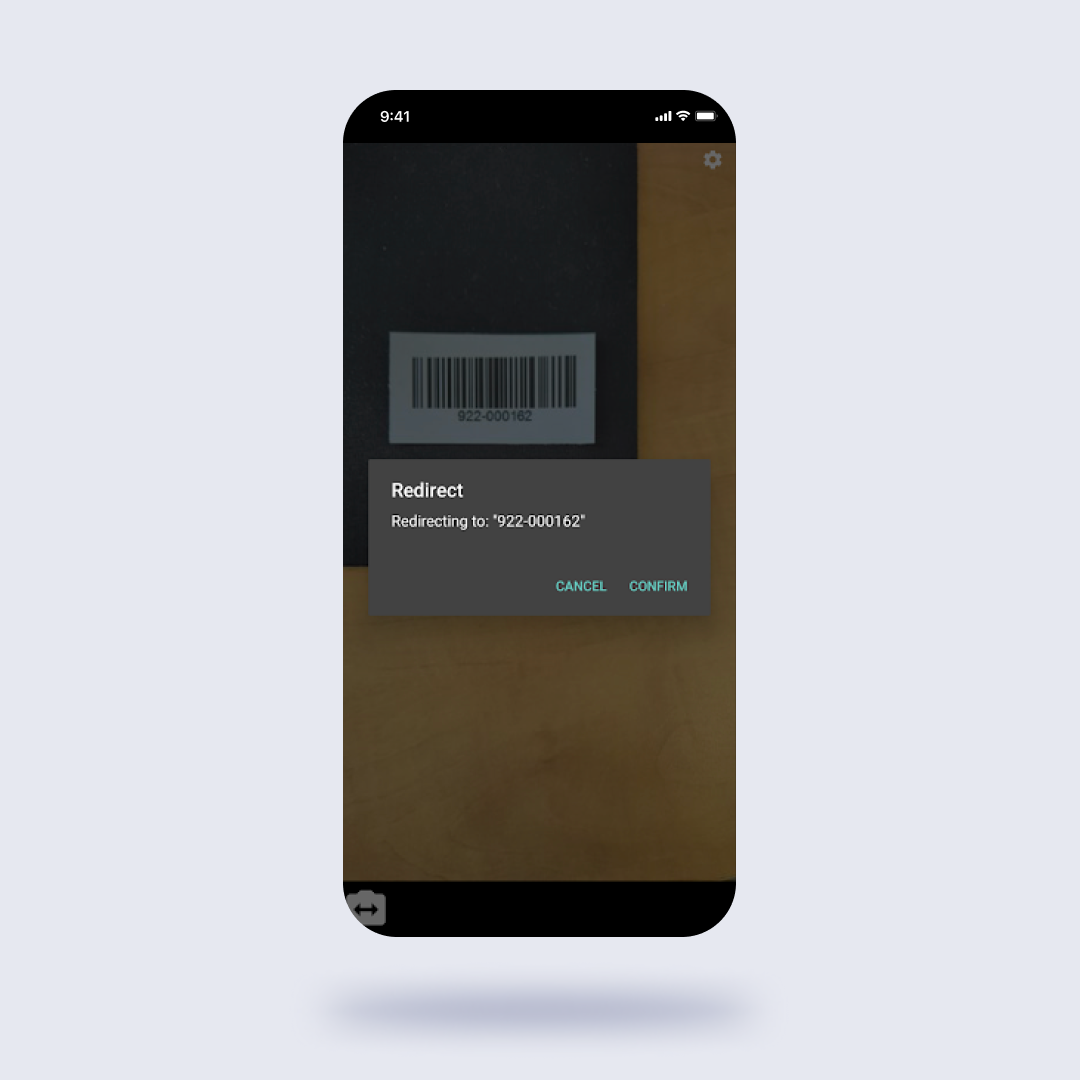 modal appearing over camera viewfinder confirming redirect to the detected barcode (barcode number is 922-000162). Modal has options to confirm or cancel